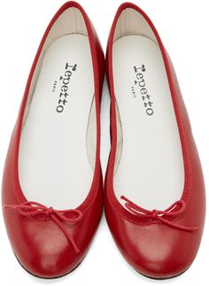 Buffed goatskin ballerina flats in red. Round toe. Bow accent at vamp. Tonal grosgrain trim at collar. Logo printed in black at white calfskin footbed. Twill lining. Leather sole in beige with black treaded rubber injection at heel. Supplier color: Hisbiscus red Red Repetto, Ruby Slippers, French Girls, Leather Ballet Flats, Ballerina Flats, Pretty Shoes, Red Bow, Luxury Streetwear, Cute Shoes