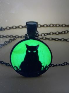 Love your Feline friends?  This pendant is perfect for Cat lovers.  It Glows in the Dark too. Black Cat illustration under a solid glass protective dome.  20" chain with lobster claw clasp. Black Cat Illustration, Here Kitty Kitty, Kitty Kitty, The Hills, Cat Illustration, Love Your, Lobster Claw, In The Dark, Glow In The Dark