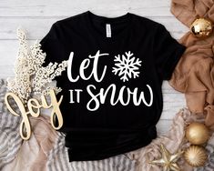 Let It Snow Shirt, Cute Winter T-Shirt, Lovely Xmas Shirt, Christmas Shirt, Christmas gift for Family, Happy New Year Tee,  Xmas Gift Tee SIZING AND COLORS Make sure you check our size-chart before you place your order. If you are not sure about sizing please measure your favorite t-shirt and compare measurements to the chart for the best fit for you. For detailed sizing information and t-shirt color options, please see listing images.   HOW TO ORDER 𝟏. Please, Check and Review all Photos. 𝟐. Winter Gift Shirt With Letter Print, Winter Letter Print Shirt For Gift, Winter Letter Print Shirt Gift, Pre-shrunk T-shirt As Winter Gift, Graphic Print T-shirt For Gift In Winter, Let It Snow Shirt, Christmas Gift For Family, Winter T Shirts, Xmas Shirts