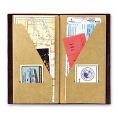 an open passport case with some cards inside