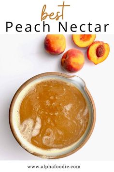 the best peach nectar is in a bowl next to fresh peaches