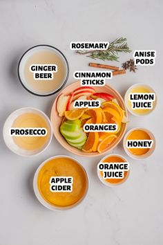 an apple cider recipe is shown with apples, cinnamon sticks, orange juice and other ingredients