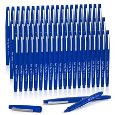 a bunch of blue pens sitting next to each other