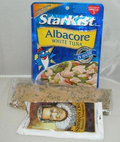 a bag of tuna next to a packet of albacore