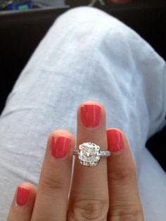 a woman's hand with a ring on top of her finger and the words pin it