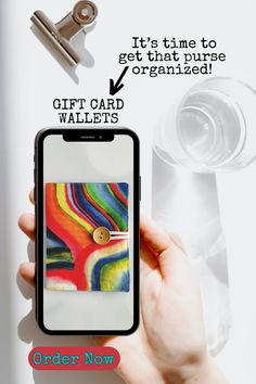 a person holding a cell phone in their hand with the text order now on it