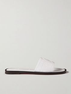 Christian Louboutin's slides are pared-back and refined, so they'll look equally chic with jeans or a dress. Made in Italy, this croc-effect leather pair has a slightly padded insole for comfort. The brand's initials are embossed and stitched on the strap. Designer White Sandals With Buckle Closure, Luxury White Leather Slides, White Summer Slides With Buckle Closure, Elegant Off-white Leather Sandals, White Slip-on Slides With Buckle Closure, Porter Bag, Christian Louboutin Women, Orlebar Brown, Flat Dress Shoes