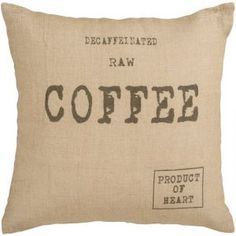 a pillow that says coffee on it with the words, decaffiated raw coffee