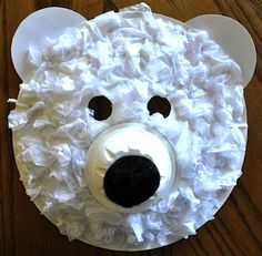 a white bear made out of toilet paper