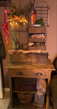 an old wooden table with some lights on it