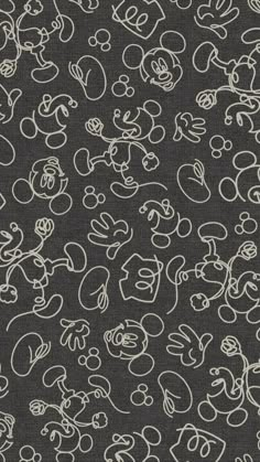 mickey mouse pattern on black fabric with white outline