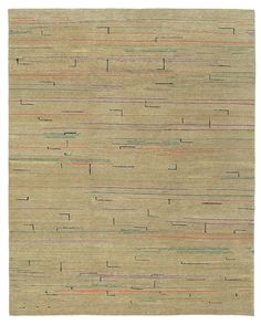 a beige rug with multicolored lines on it