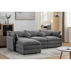 a living room scene with focus on the sectional sofa