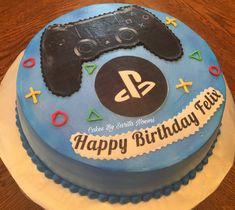 a birthday cake with a video game controller on it