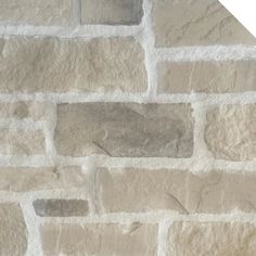 a close up view of a stone wall