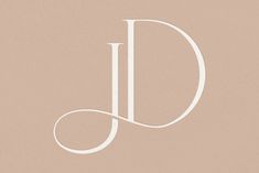 the letter j is shown in white on a beige background