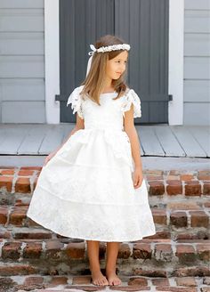 This dress is a true classic, with an elegant lace overlay and vintage charm. Perfect for a special occasion like a communion, it's also dainty and delicate. Say yes to this special dress! - True to size - Dry clean only Short Communion Dresses, Comunion Dress Catholic First Communion, First Communion Dresses Catholic Simple, Communion Dresses Catholic, First Communion Dresses Catholic, Comunion Dress, White Communion Dress, Closet Clothing, Special Dress