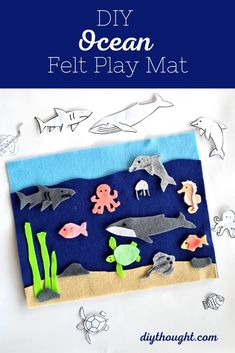 an ocean felt play mat with sea animals on it