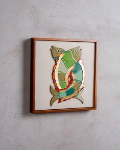 a painting on the wall of a fish