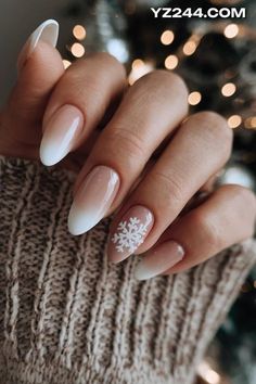 French Tip Nails With Design Winter, Almond Winter Nails Simple, White Nails With Blue Snowflakes, White Snowflake Nails Short, Winter Almond Nails Short, Winter Nails White And Blue, White Snowflake Nails Acrylic, White Winter Nails Short, Simple Blue Winter Nails