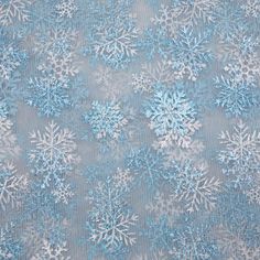 blue and white snowflakes on grey fabric