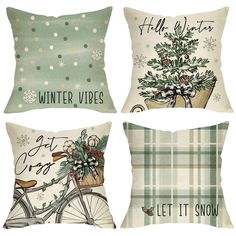 four pillows with christmas designs on them, one has a bicycle and the other has a snowflake