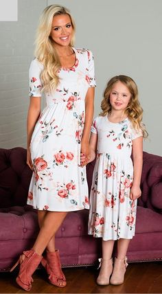 This lovely momma and daughter dress set is simply perfect. Featuring a lovely floral pattern, an empire waist and a flowing skirt. Made with a polyester and cotton blend for comfort and style. Save 20% if buying a 2 or More daughter dresses using code: Momma&Me at checkout Dress For Mom, Mother Daughter Dresses, Daughter Dress, Pleated Chiffon Skirt, Cute Floral Dresses, Mother Daughter Dress, Mommy And Me Dresses, Mommy And Me Outfits, White Floral Dress