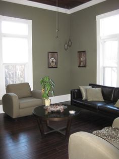 a living room with two couches and a coffee table