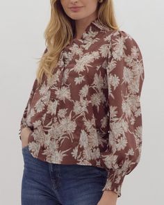 Get ready to bloom in this Floral Print Ruffle Neck Top - Brown! With its playful ruffle neck and beautiful floral print, this top adds a touch of whimsy to any outfit. Don't be afraid to stand out in this unique piece! Floral print ruffle neck smocked cuff long sleeve button down poplin blouse. Unlined. Woven. Non-sheer. Lightweight. 100% cotton Model is 5'10 and wearing a size small FINAL SALE - CANNOT BE RETURNED OR EXCHANGED Brown Floral Print, Poplin Blouse, Faux Leather Moto Jacket, Don't Be Afraid, Leather Moto Jacket, Brown Floral, Faux Fur Collar, Clothes Gift, First Look