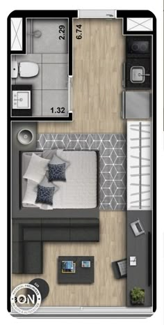 an overhead view of a bedroom and living room in a small apartment with wood flooring