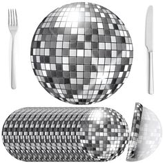 a mirror ball, fork and knife on a white background