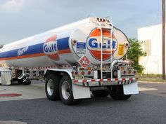 a large tanker truck parked in a parking lot