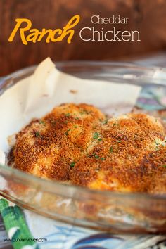 an image of a chicken dish in a glass bowl on a table with the text, ranch cheddar chicken