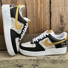 Represent your high school, sports team, or organization with these sleek Black and Gold custom Air Force 1s. You may add a logo to one side of the heel and a message of your choice on the other side. I also do alternative colors and designs, please indicate what color(s) and design(s) you would like for your order. The Primary color is the color of the Nike Check or what you see in gold The Secondary color is what you see in black. School is fast approaching! Get your custom shoes to start the new year in style! Gold Air Force 1, Gold Nike Shoes, Custom Painted Shoes, Air Force 1s, Air Force 1 Custom, High School Sports, Custom Painted, Fabulous Shoes, School Sports