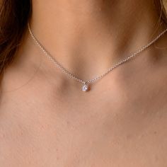 This dainty tiny Cubic Zirconia pendant necklace has a delicate chain and a minimalist style. It is so elegant and can be layered with other necklaces. The chain is solid sterling silver 925., and there is an extension so that the size can be adjusted. If you would like a custom order or have any questions please contact me, thanks. White Gold Birthstone Necklace With Delicate Chain, Everyday Delicate Cubic Zirconia Charm Necklaces, Delicate White Gold Birthstone Necklace With Delicate Chain, Dainty Diamond White Charm Necklace For Gift, Dainty Sterling Silver Solitaire Necklace With Clavicle Chain, Minimalist Solitaire Pendant Necklace With Clavicle Chain, Dainty Diamond Charm Necklaces, Delicate Silver Diamond Necklace With Birthstone, Minimalist White Gold Birthstone Necklace With Delicate Chain