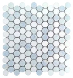 a white and blue mosaic tile with circles on the bottom, in shades of light blue