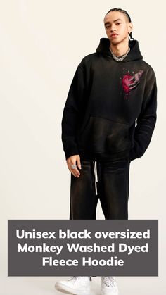 a man in black sweatshirt and pants with the words, unisex black oversized monkey washed dyed fleeie hoodie