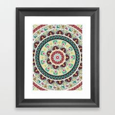 a framed art print with an abstract circular design in red, green and blue colors