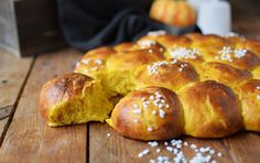 a close up of bread on a wooden table