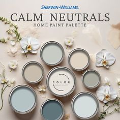 several paint cans with white flowers on them and the words calm neutrals above them