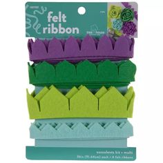 felt ribbons in assorted colors and sizes, with flowers on each one's side