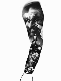 a black and white photo of a man's arm with the joker movie poster on it