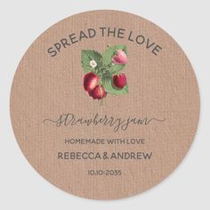 a round sticker with the words spread the love and strawberries on it in black ink