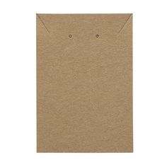 a piece of brown paper with two holes in the middle and one hole at the bottom