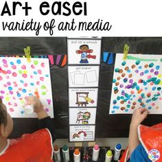 two young boys are working on their art project with the words art easel and variety of art media