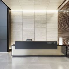 an empty reception area in a modern building