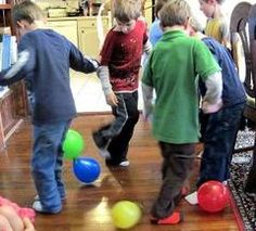 children playing with balls in the living room