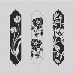 three decorative bookmarks with flowers on them