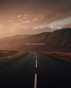 an empty road with the words trust your journey on it