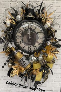 a clock that is on the side of a brick wall with decorations around it and an ad for debby's decor and more